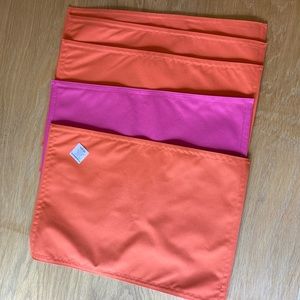 Crate & Barrel reversible vinyl pace mats (5) pink to orange